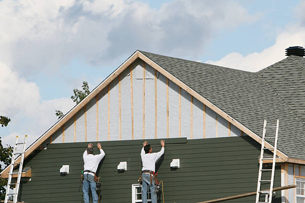 Professional Siding Installation technician working in Lindenhurst, NY